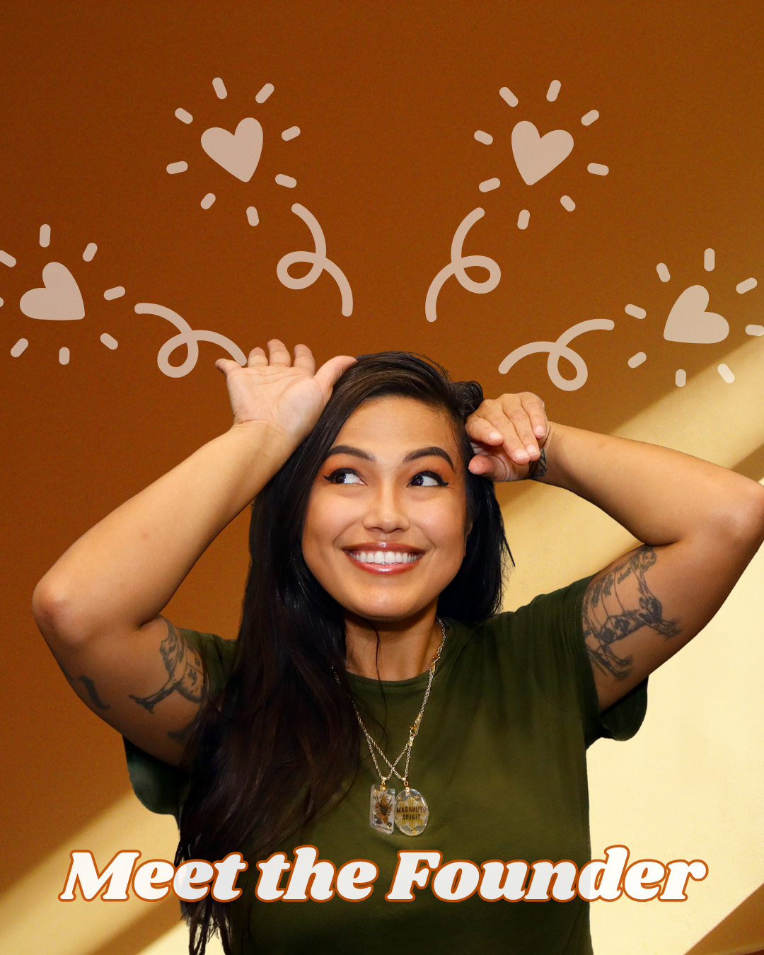 Smiling woman with long dark hair posing against a warm brown background with illustrated heart details